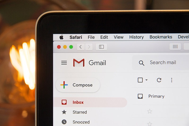 Corner of laptop screen open to Gmail for email marketing
